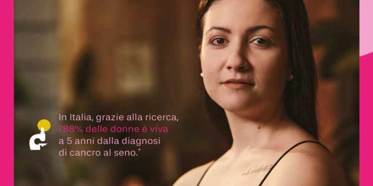 IL NASTRO ROSA INCOMPLETO DI FONDAZIONE AIRC SIMBOLO DELL’IMPEGNO DELLA RICERCA PER CURARE TUTTE LE DONNE CON TUMORE AL SENO